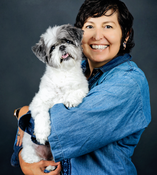 Professor Rojas pictured with her dog.